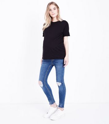 Umstandsmode - Schwarzes, kurzärmliges T Shirt aus Bio Baumwolle Für später speichern Von gespeicherten Artikeln entfernen Umstandsmode - Schwarzes, kurzärmliges T Shirt aus Bio Baumwolle Für später speichern Von gespeicherten Artikeln entfernen